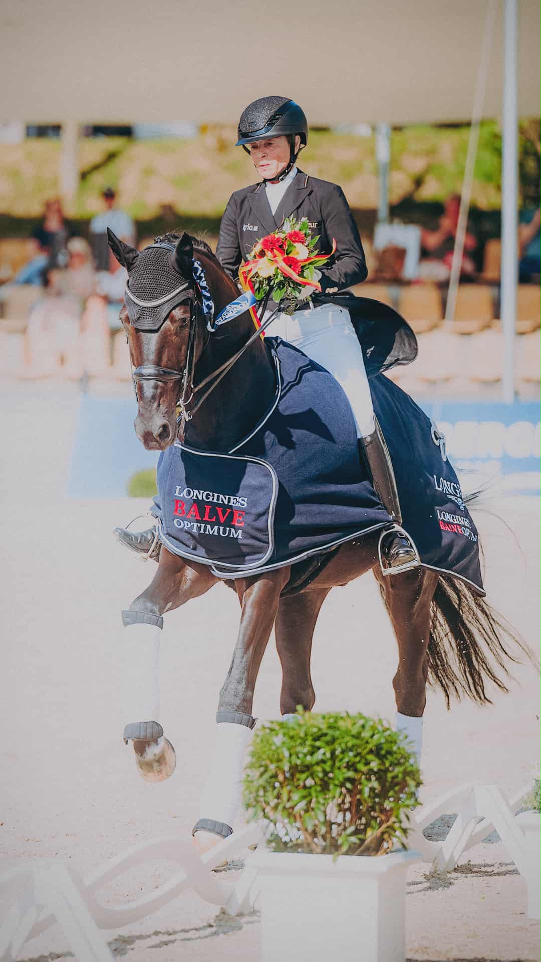 Isabell Werth & Wendy de Fontaine in a black equestrian horse riding helmet
